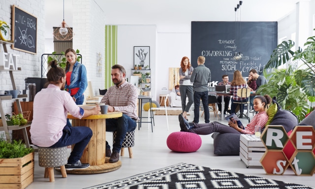 People working in modern startup agency relaxing during a break