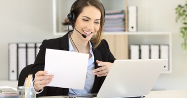 Contact centre agent delivering customer service from her home office