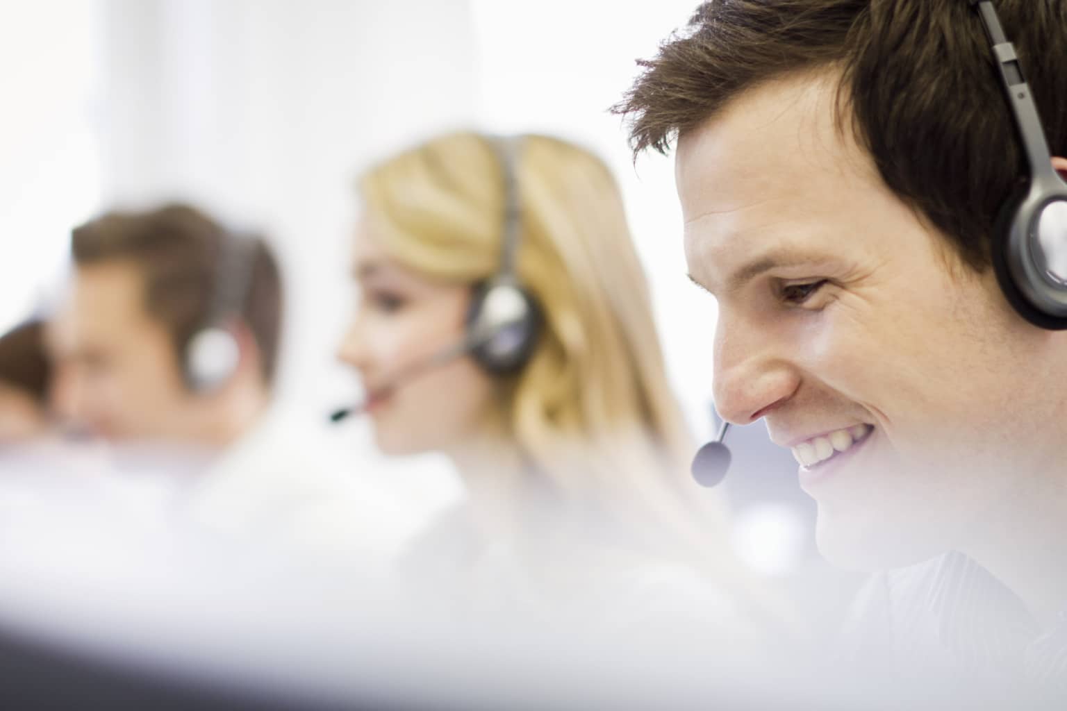 Business people working in headsets-990