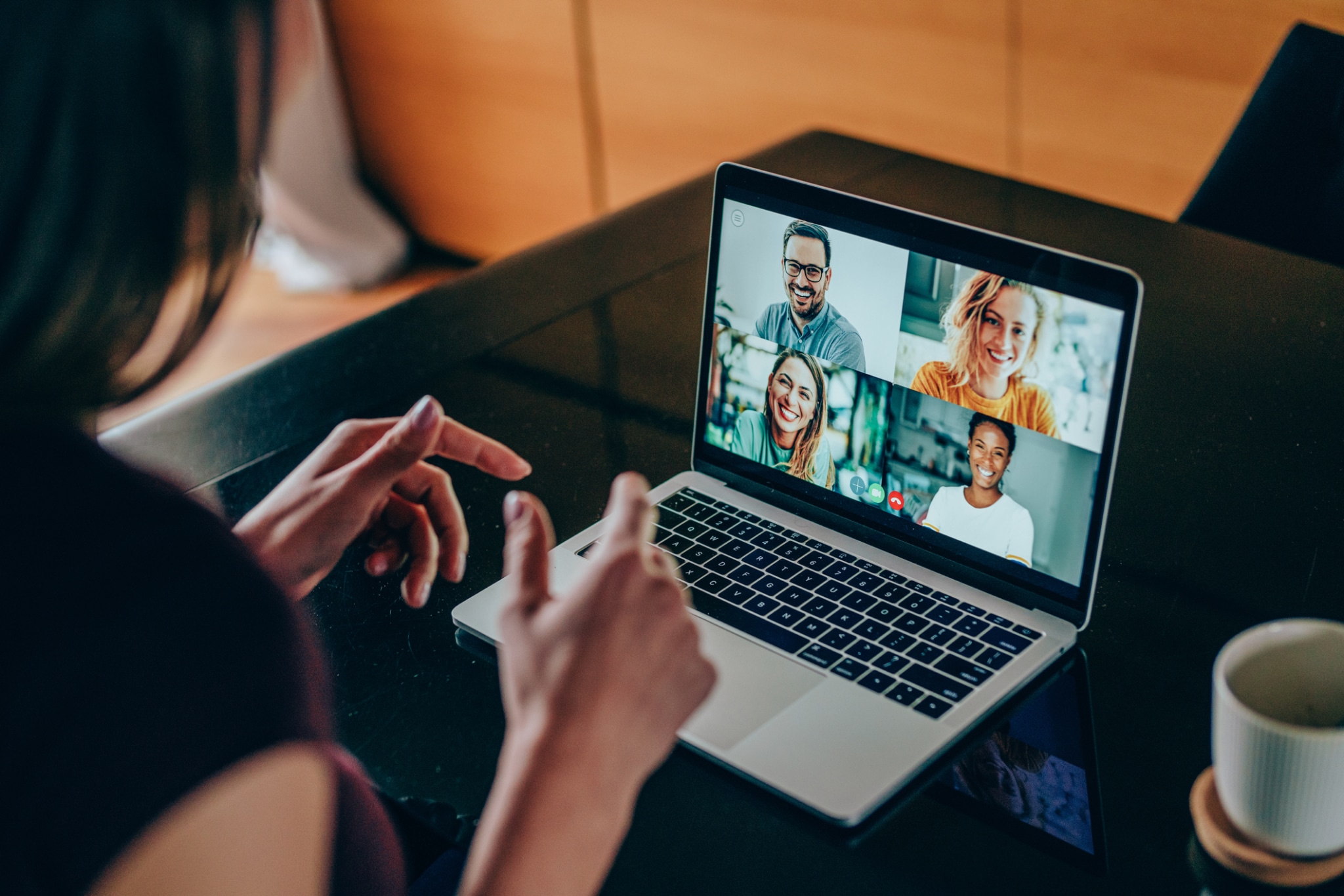 using laptop for a online meeting in video call